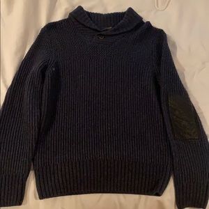 Denver Hayes, cotton sweater with leather elbows.